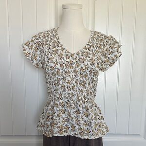 Floral smocked peplum top